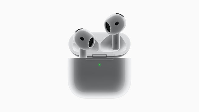 Apple AirPods 4 earbuds in their open charging case, front view
